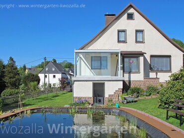 Verglaster Balkon - mit transparenten Glasschiebeelementen