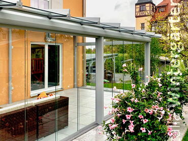 Terrasse -Verglasungen mit flächigen Glaselementen 2